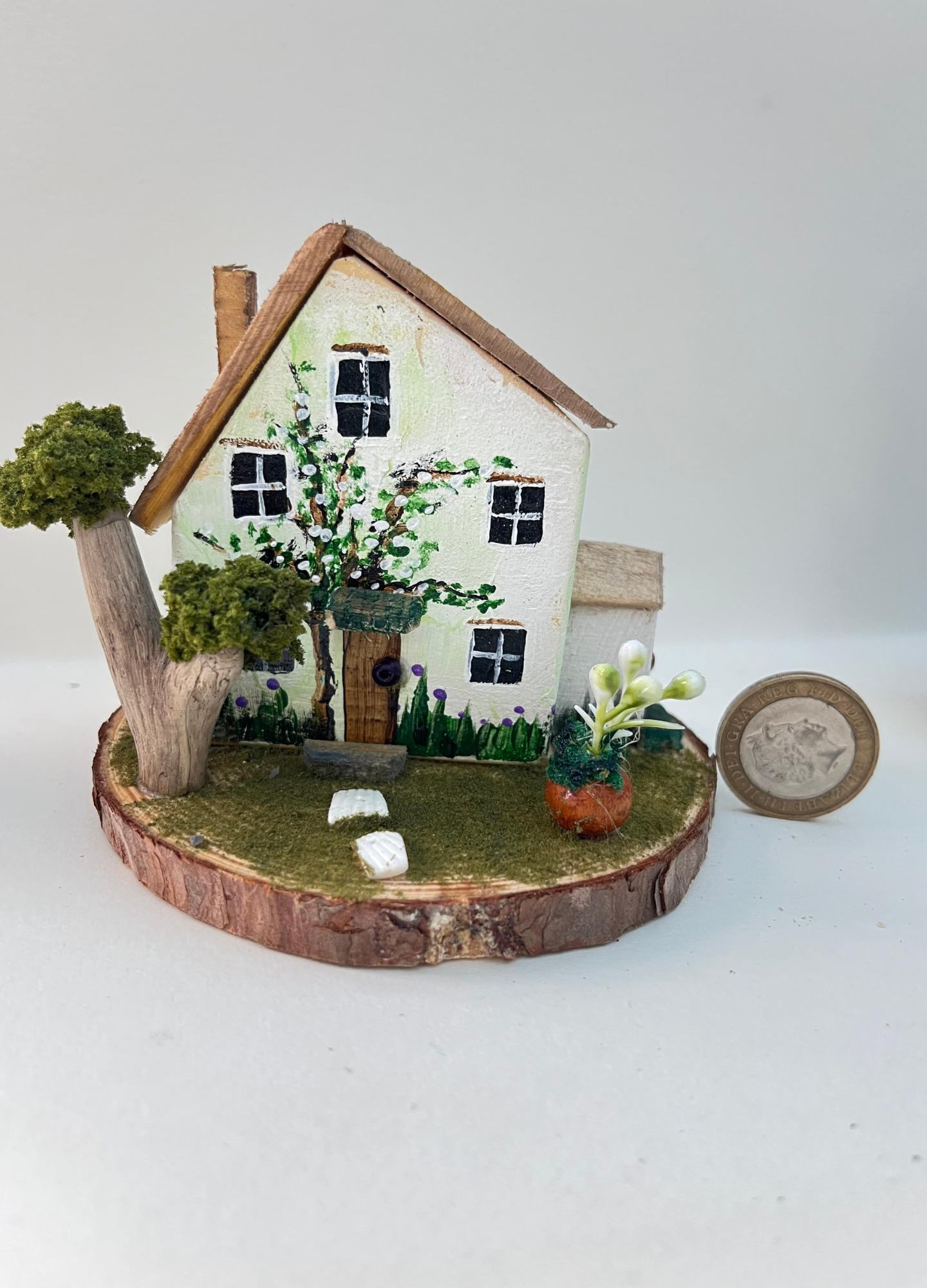 Miniature diorama with a house, and plants on a white background (RRH1040) (Copy)