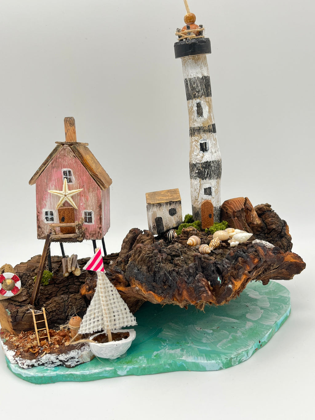 Miniature House and Lighthouse out at Sea  RRS1008