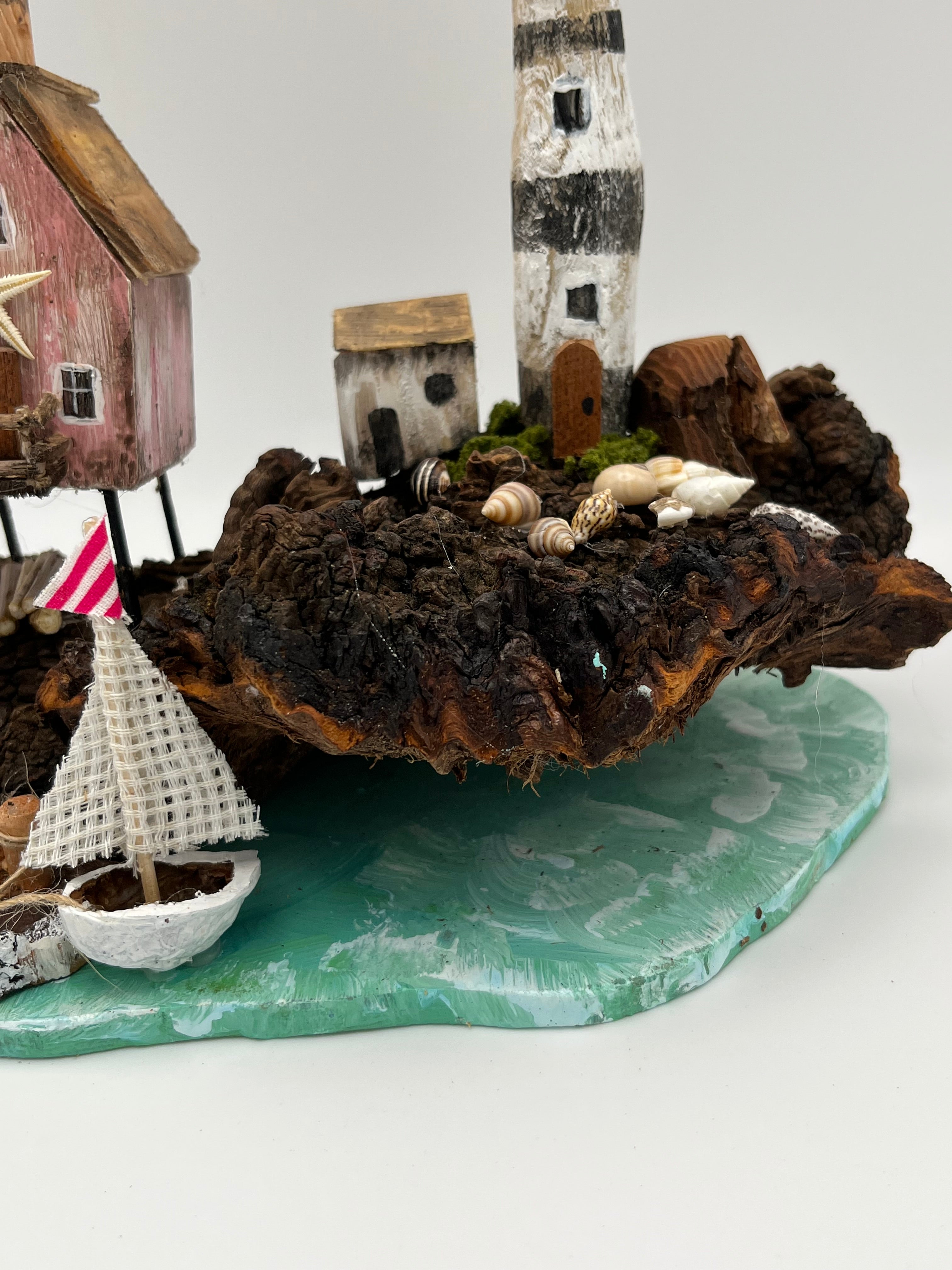 Miniature House and Lighthouse out at Sea  RRS1008
