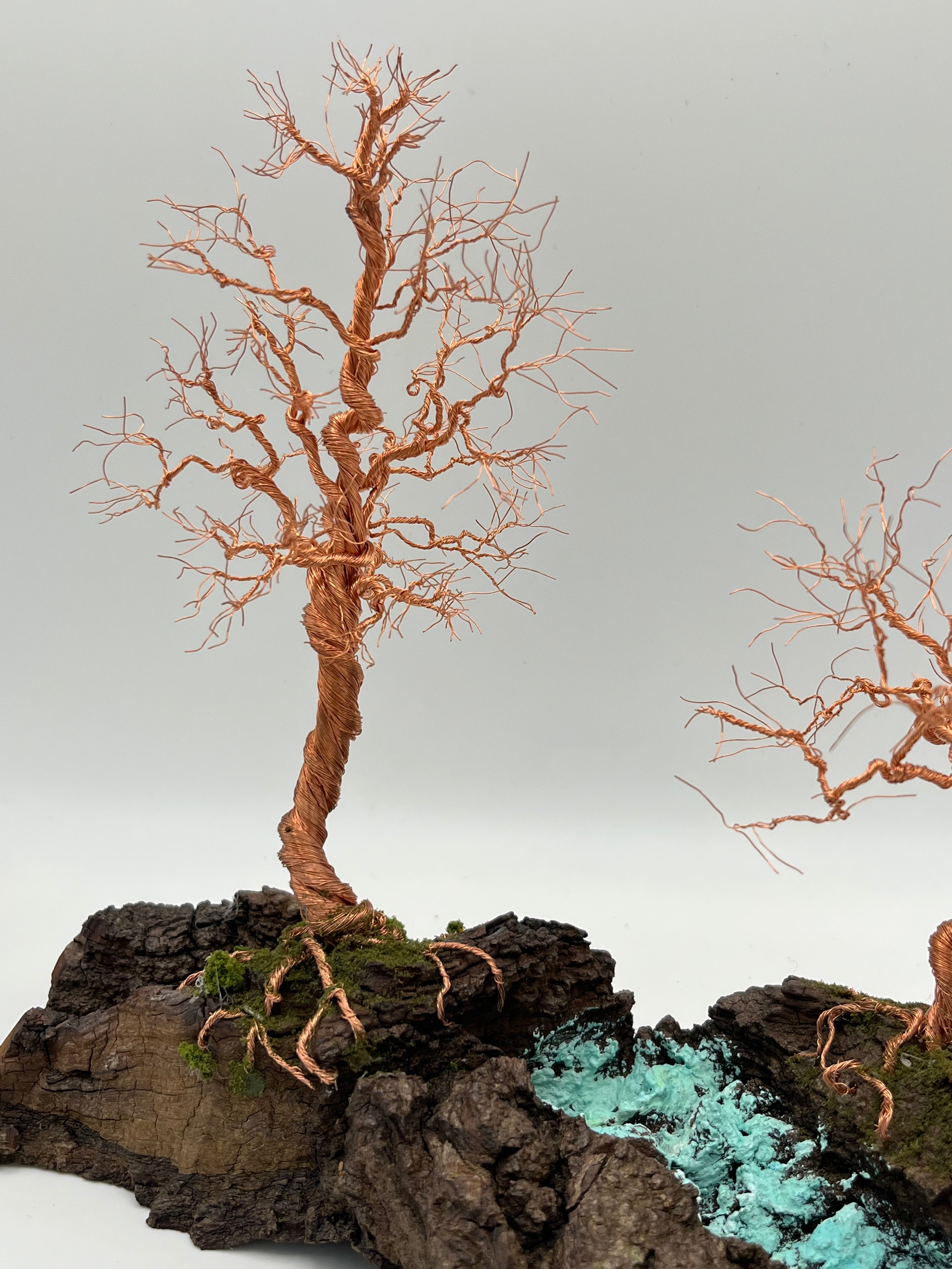 Pair of Handcrafted miniature copper wire trees by the water on natural bark (RRT007)