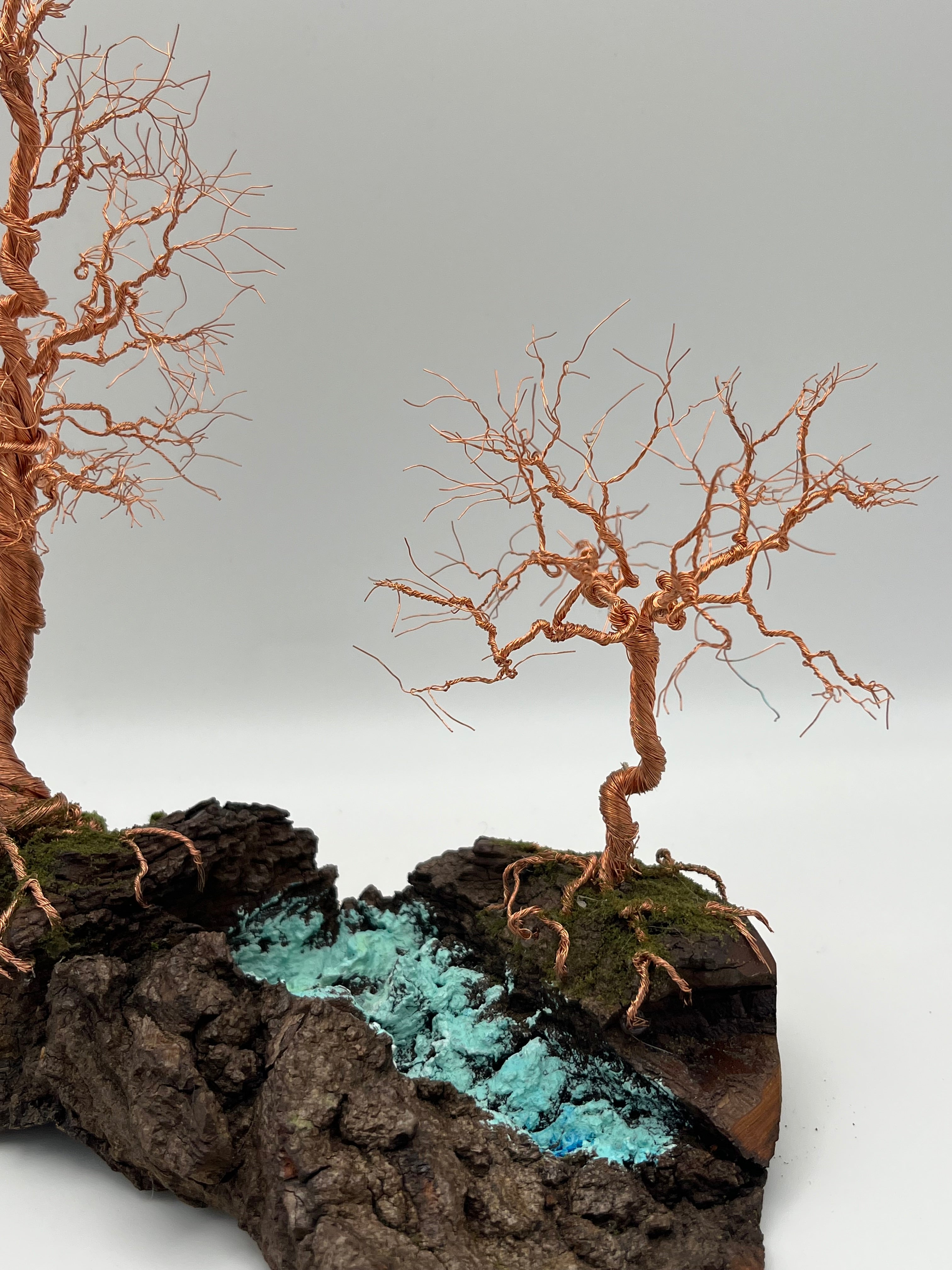 Pair of Handcrafted miniature copper wire trees by the water on natural bark (RRT007)