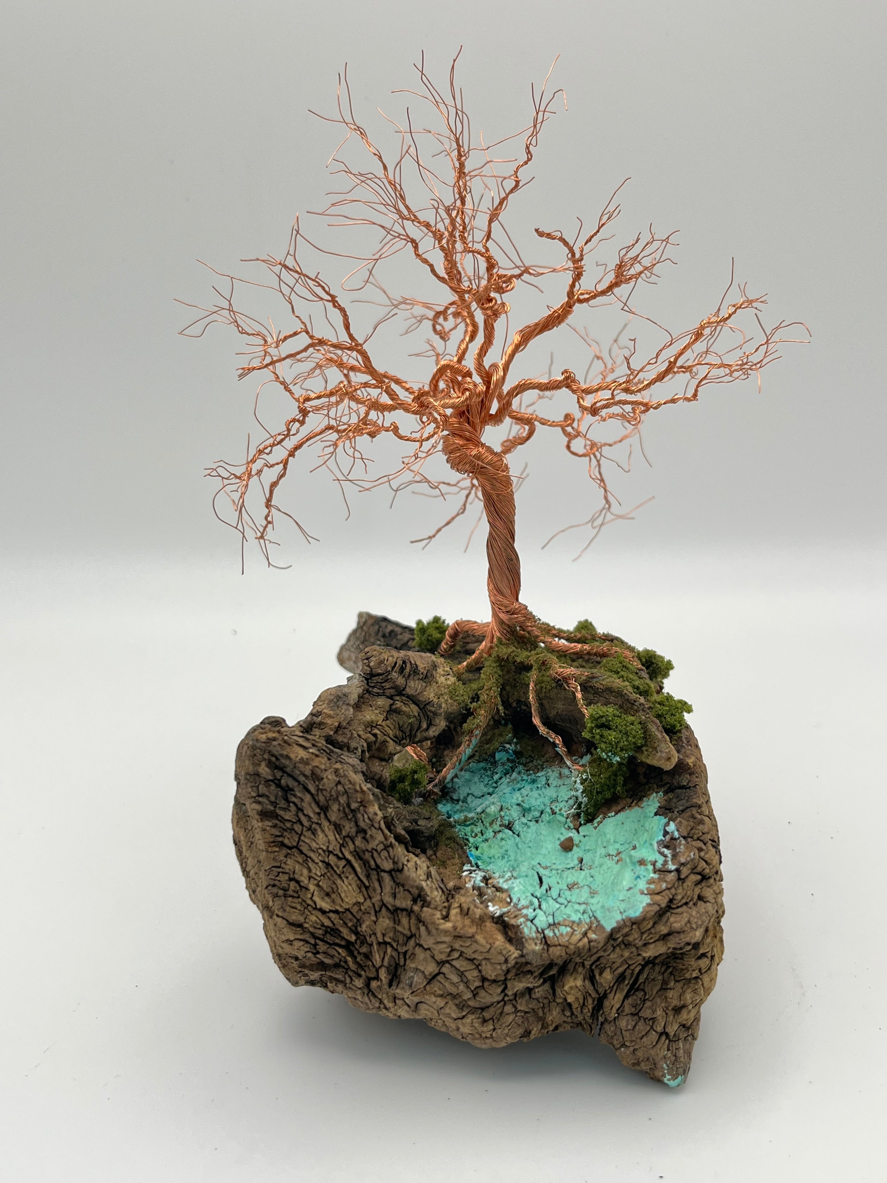 Single Handcrafted miniature copper wire tree by the water on natural bark (RRT009)