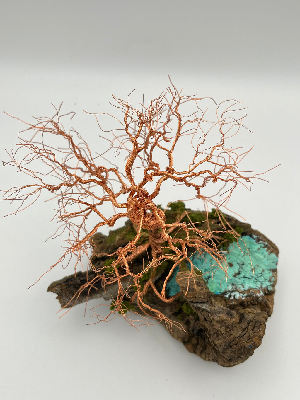 Single Handcrafted miniature copper wire tree by the water on natural bark (RRT009)