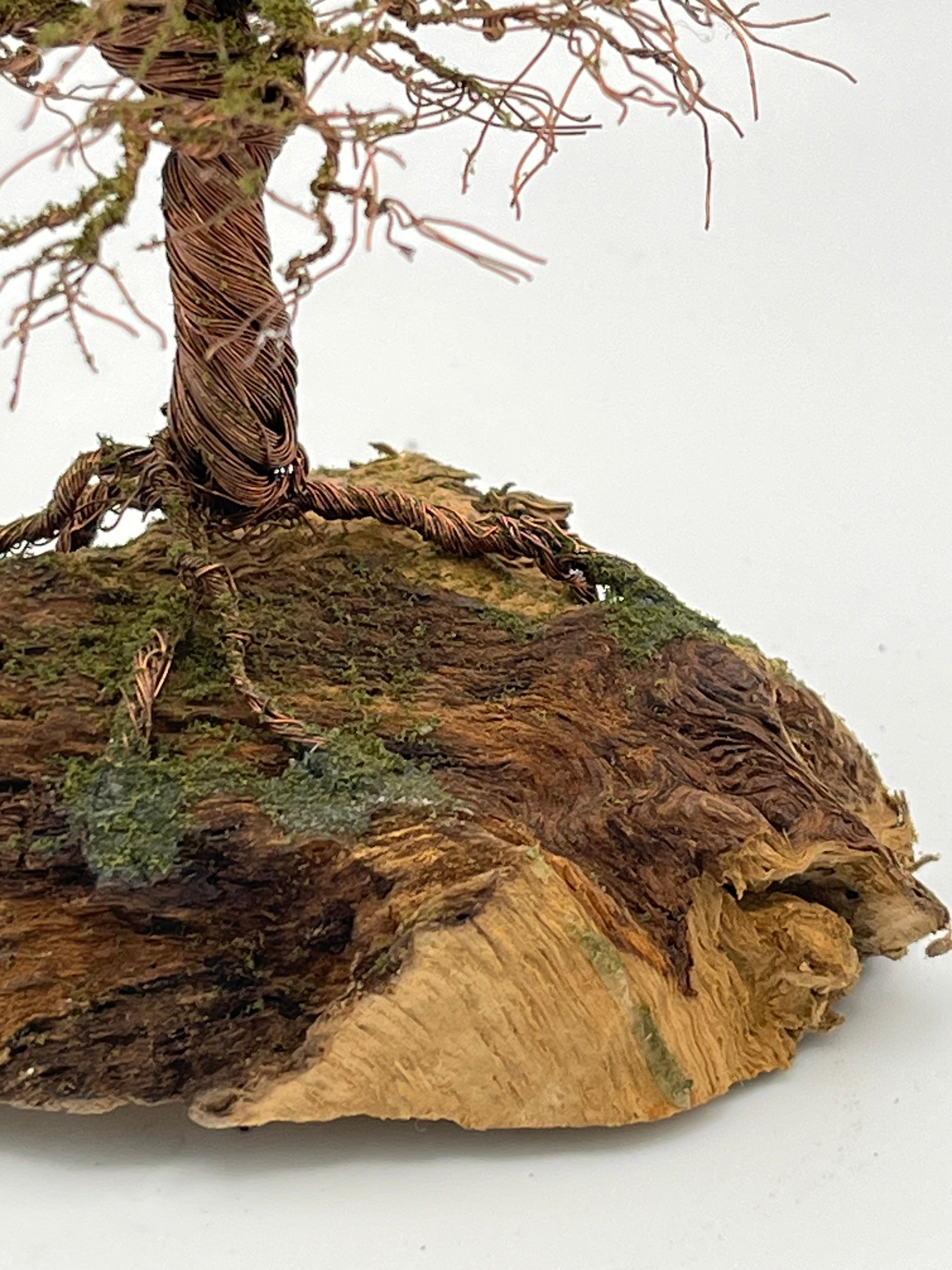 Single Handcrafted miniature copper wire tree by the water on natural bark (RRT010)