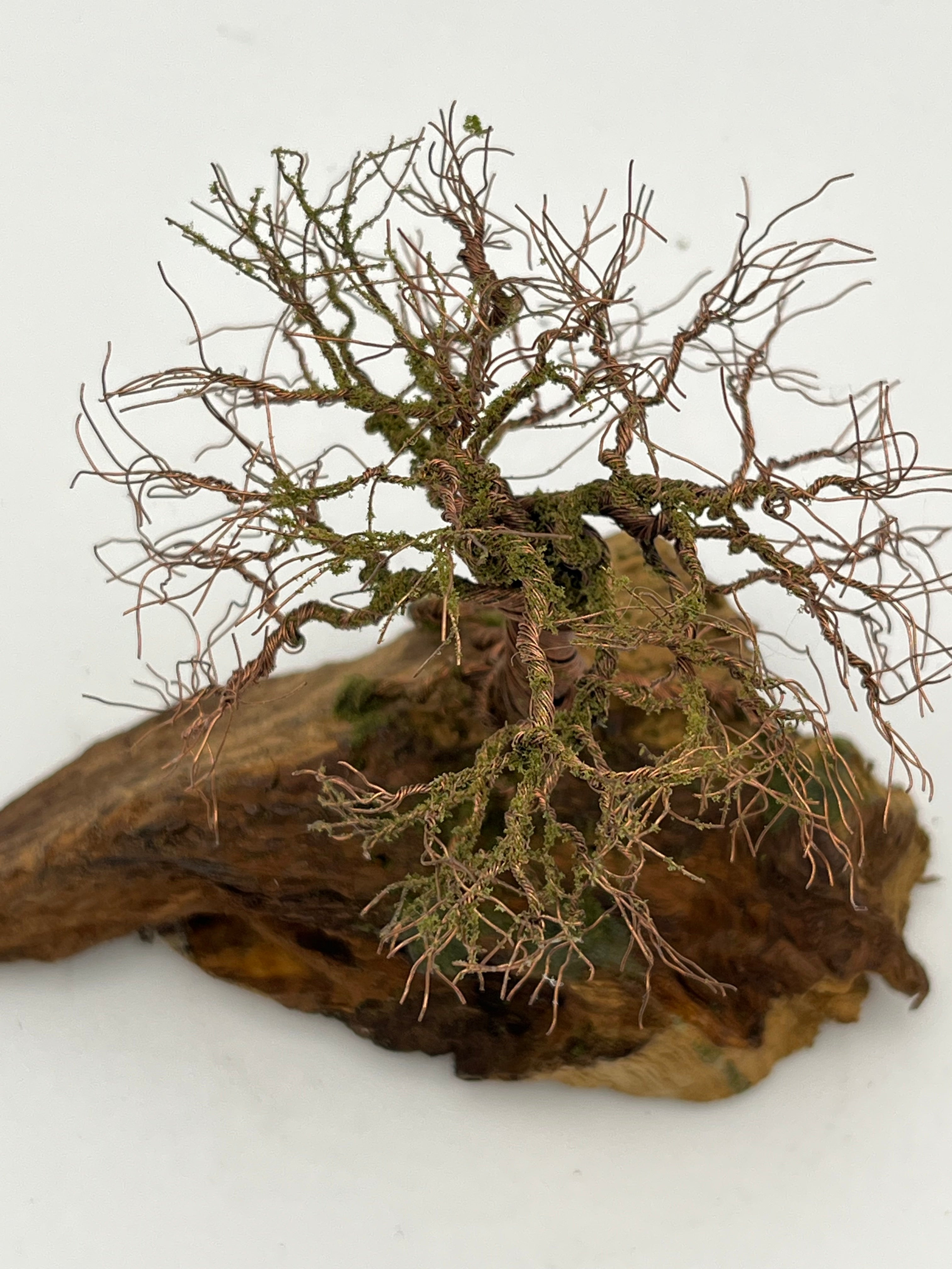 Single Handcrafted miniature copper wire tree by the water on natural bark (RRT010)