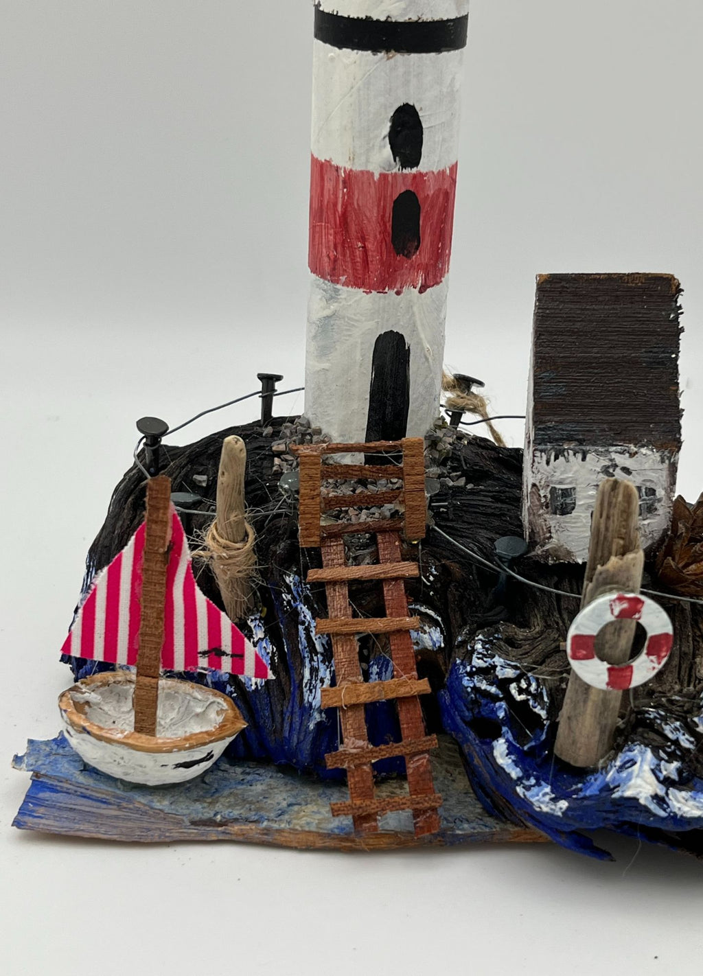 Lighthouse on the rocks RRS002