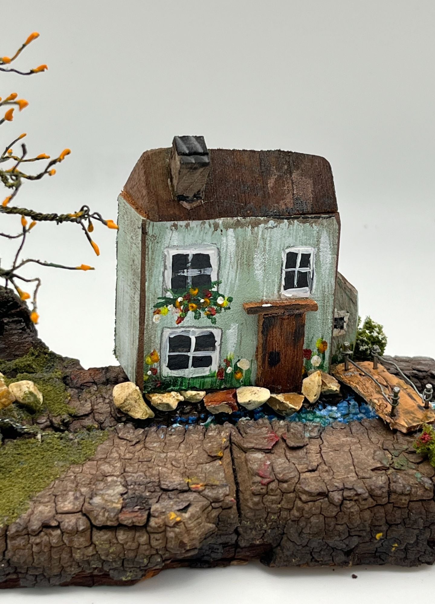 Handcrafted Miniature Wooden House by a stream on Natural Base handcrafted wire tree RRH1013