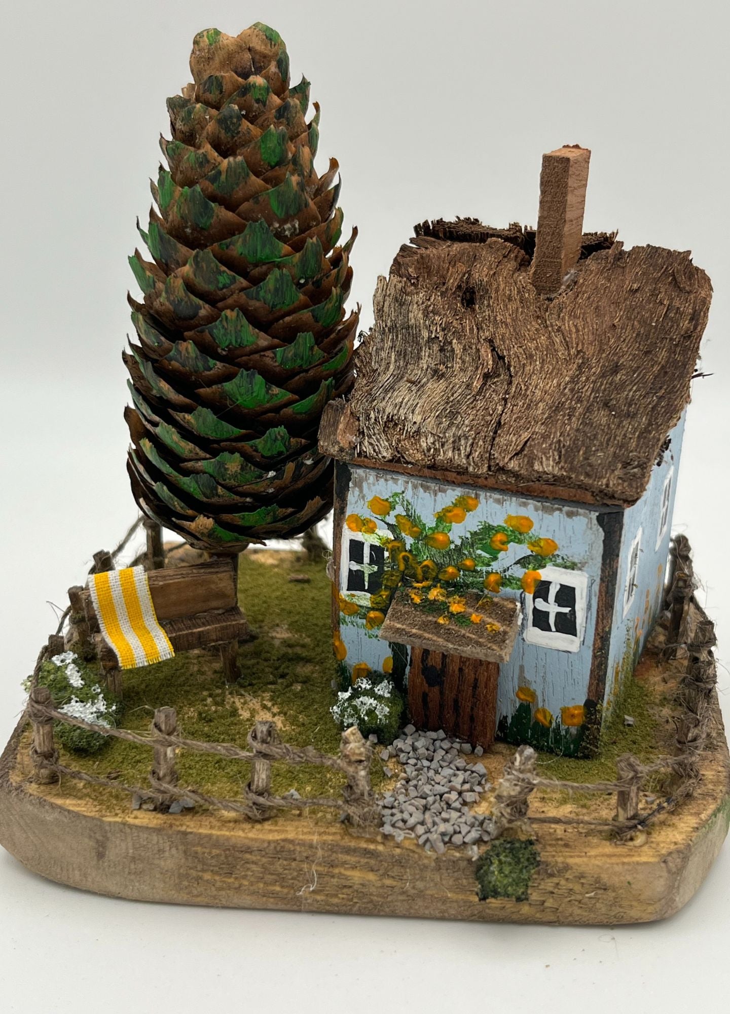 Handcrafted Miniature Wooden House on Natural Base  RRH1004