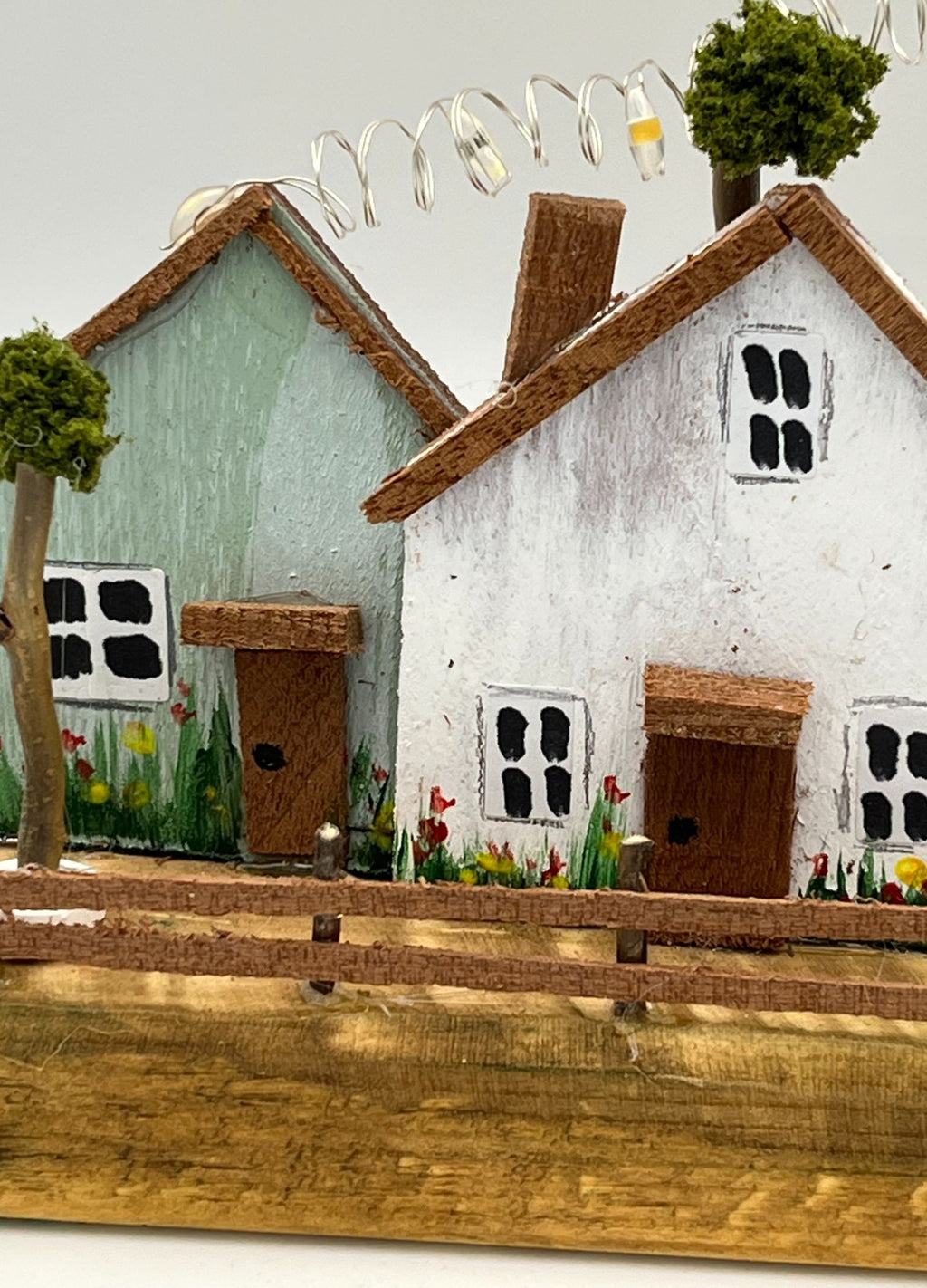 Handcrafted Miniature Wooden Houses on Natural Base with led lights RR1011