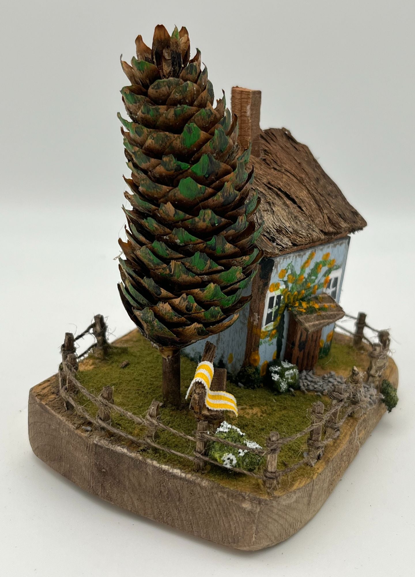 Handcrafted Miniature Wooden House on Natural Base  RRH1004