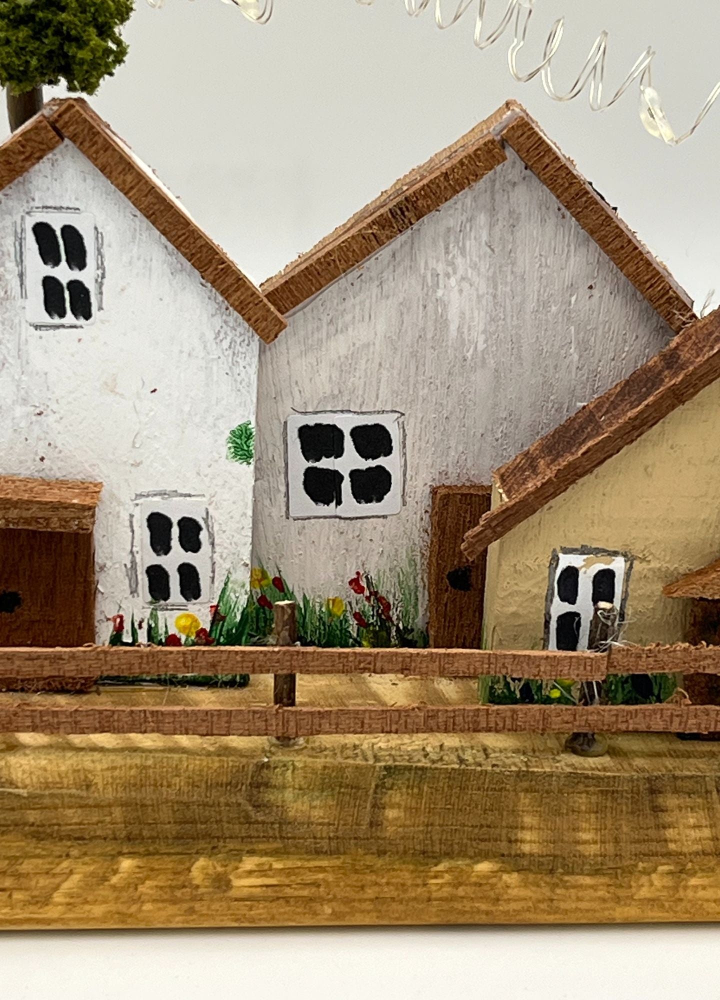 Handcrafted Miniature Wooden Houses on Natural Base with led lights RR1011