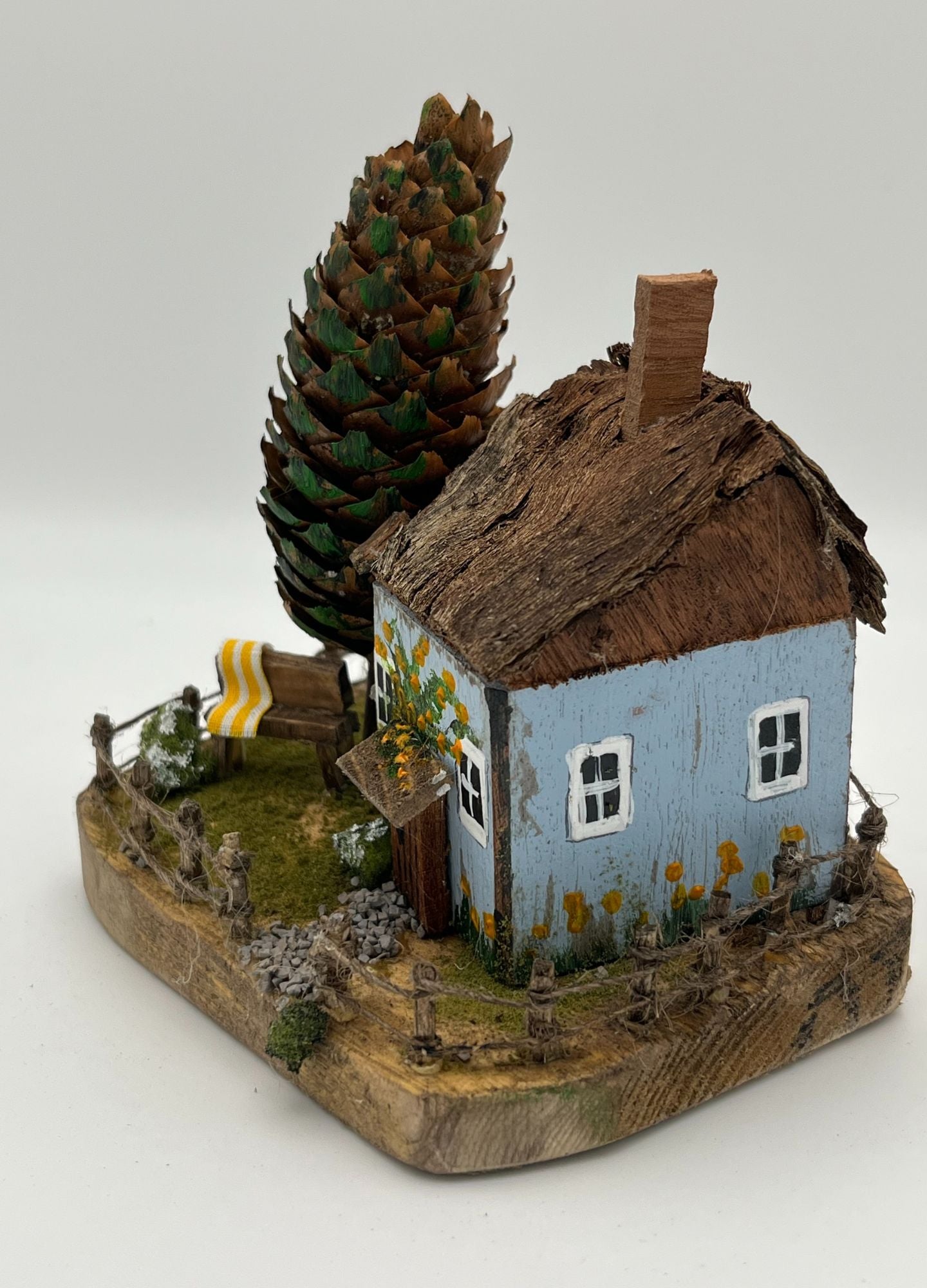 Handcrafted Miniature Wooden House on Natural Base  RRH1004