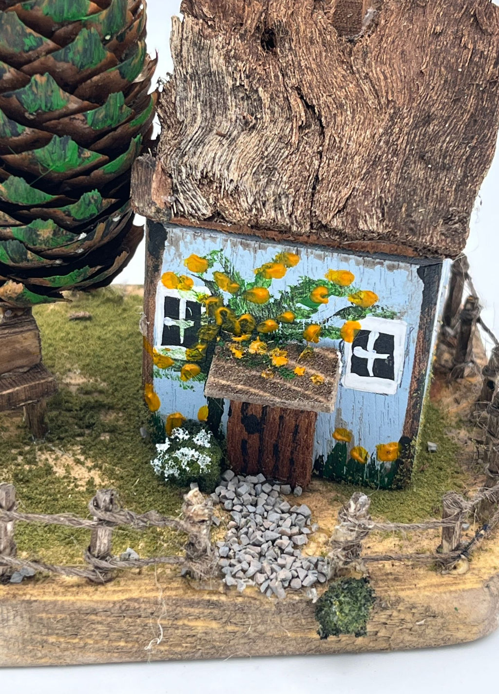 Handcrafted Miniature Wooden House on Natural Base  RRH1004