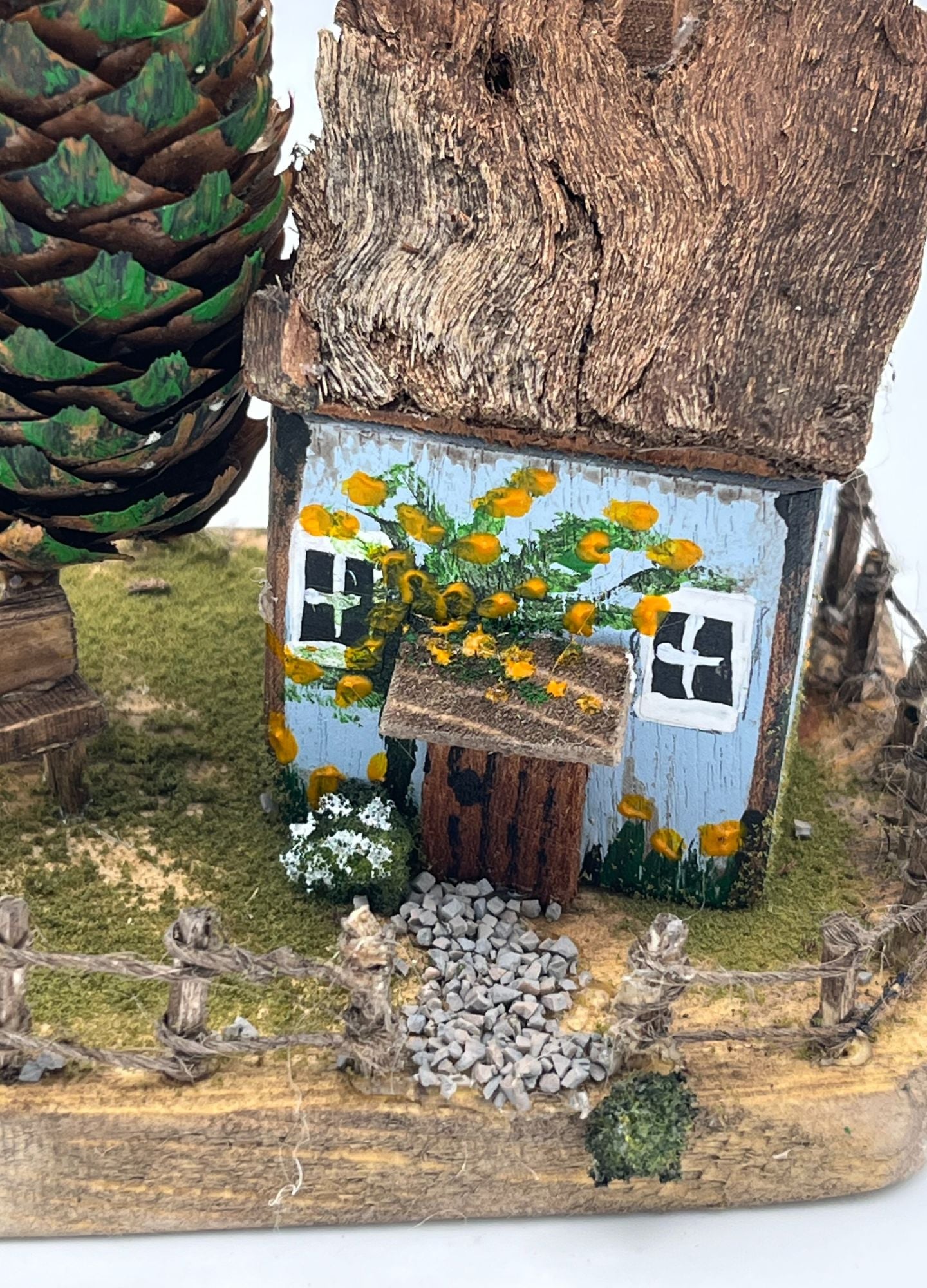 Handcrafted Miniature Wooden House on Natural Base  RRH1004